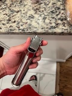 Kuhn Rikon Epicurean Garlic Press, Stainless Steel, 6.5 x 1 x 1.5 inches, Silver Customer Review Kuhn Rikon Epicurean Garlic Press, Stainless Steel, 6.5 x 1 x 1.5 inches, Silver - Customer Photo 2