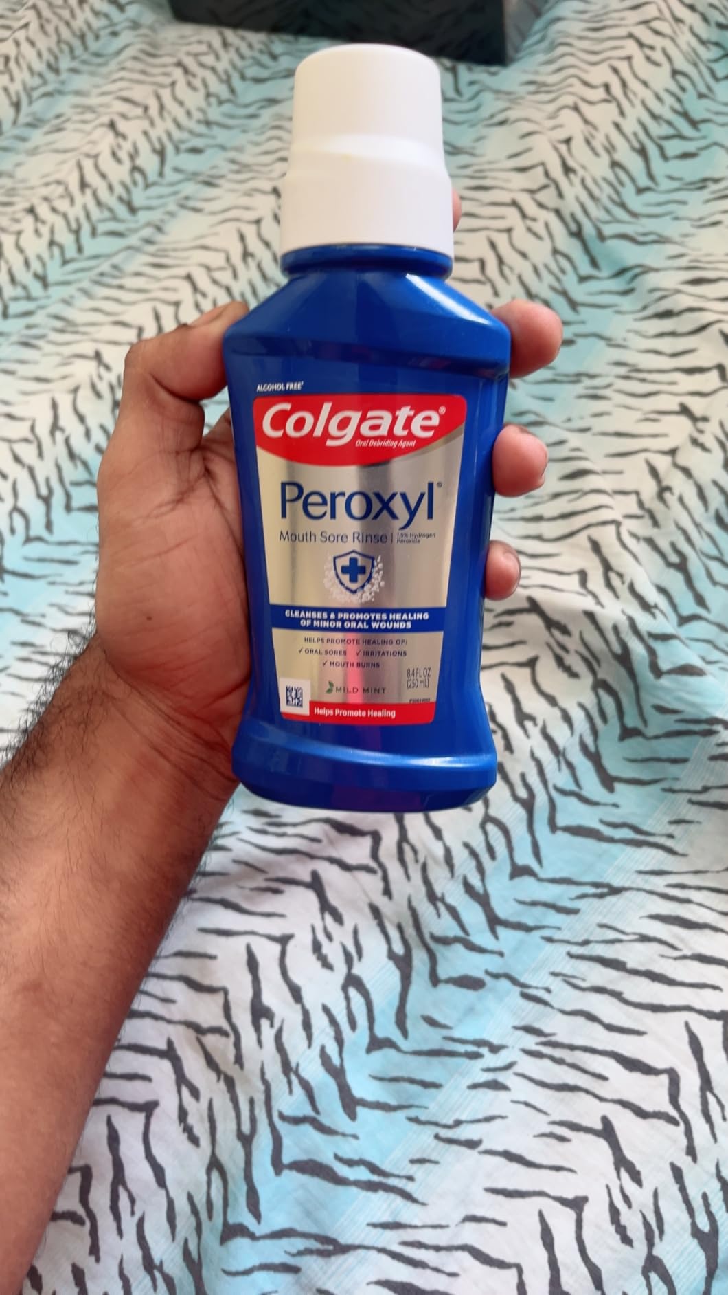 Colgate Peroxyl Antiseptic Mouthwash and Mouth Sore Rinse, 1.5% Hydrogen Peroxide, Mild Mint - 500ml, 16.9 Fluid Ounces Customer Review Colgate Peroxyl Antiseptic Mouthwash and Mouth Sore Rinse, 1.5% Hydrogen Peroxide, Mild Mint - 500ml, 16.9 Fluid Ounces - Customer Photo 2