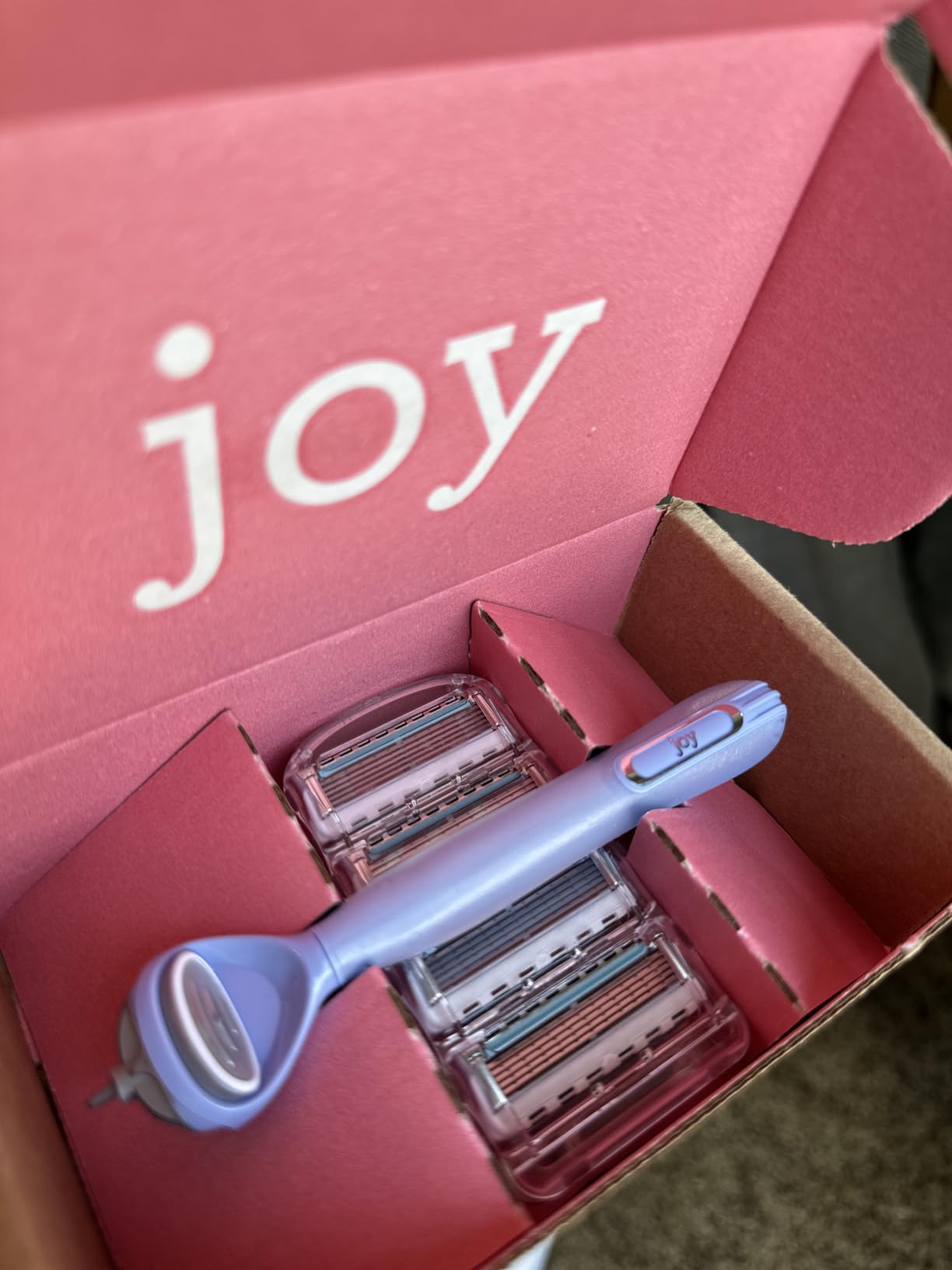 Amazon Basics 5-Blade Razor Handle for Women, Includes 12 Cartridges and Shower Hanger, 14 Piece Set, Blue - Customer Photo 2