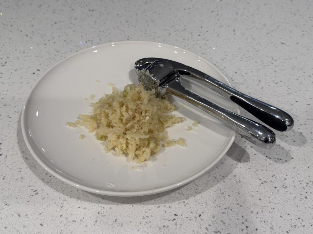 Zulay Kitchen Premium Garlic Press Set - Rust Proof Professional Garlic Mincer Tool - Easy-Squeeze, Easy-Clean with Soft, Ergonomic Handle - Silicone Garlic Peeler & Brush (Silver) Customer Review Best Garlic Press