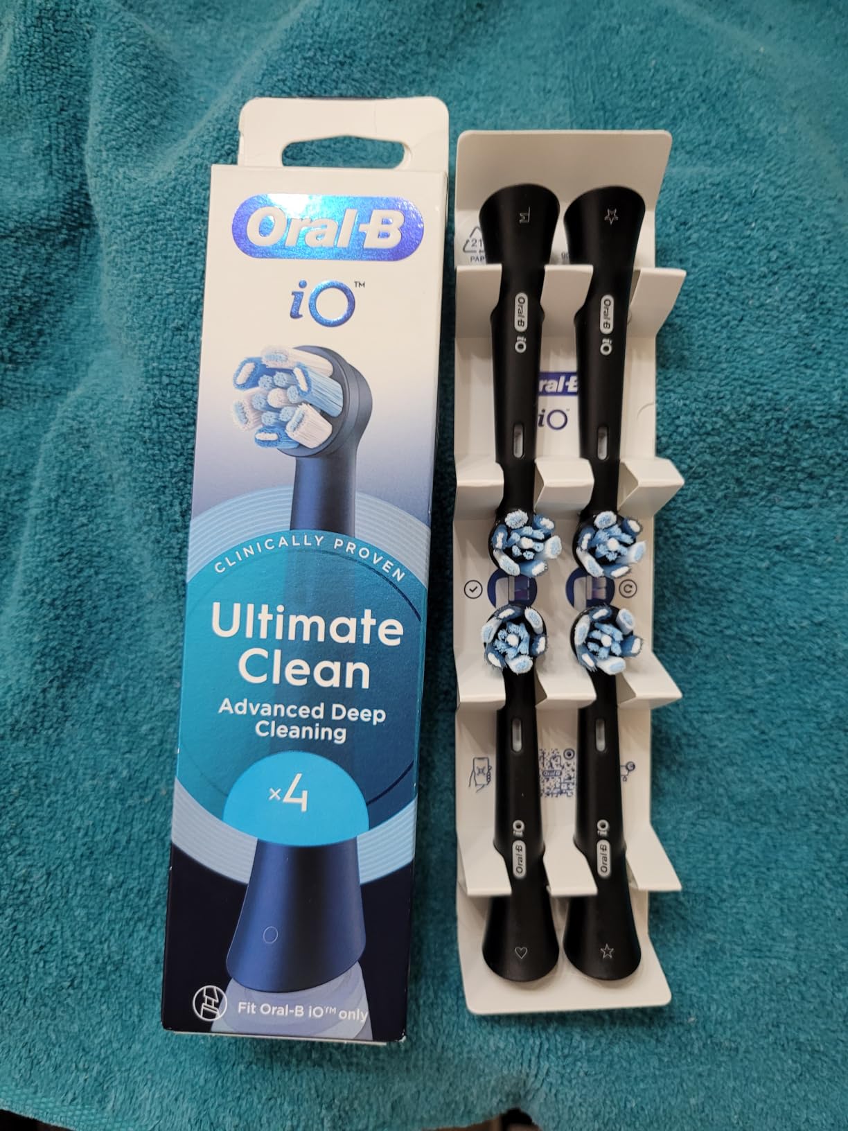 Oral-B iO Ultimate Clean Electric Toothbrush Head, Twisted & Angled Bristles for Deeper Plaque Removal, Pack of 4, Suitable for Mailbox, Black Customer Review Oral-B iO Ultimate Clean Electric Toothbrush Head, Twisted & Angled Bristles for Deeper Plaque Removal, Pack of 4, Suitable for Mailbox, Black - Customer Photo 1