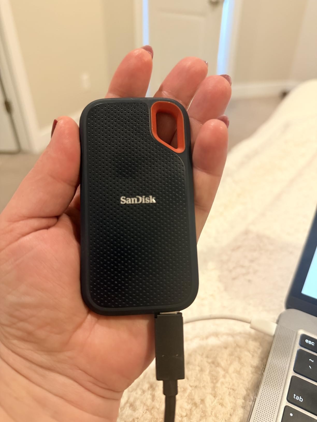 SANDISK 1TB Extreme Portable SSD - Up to 1050MB/s, USB-C, USB 3.2 Gen 2, IP65 Water and Dust Resistance, Updated Firmware - External Solid State Drive - SDSSDE61-1T00-G25 customer photo 1