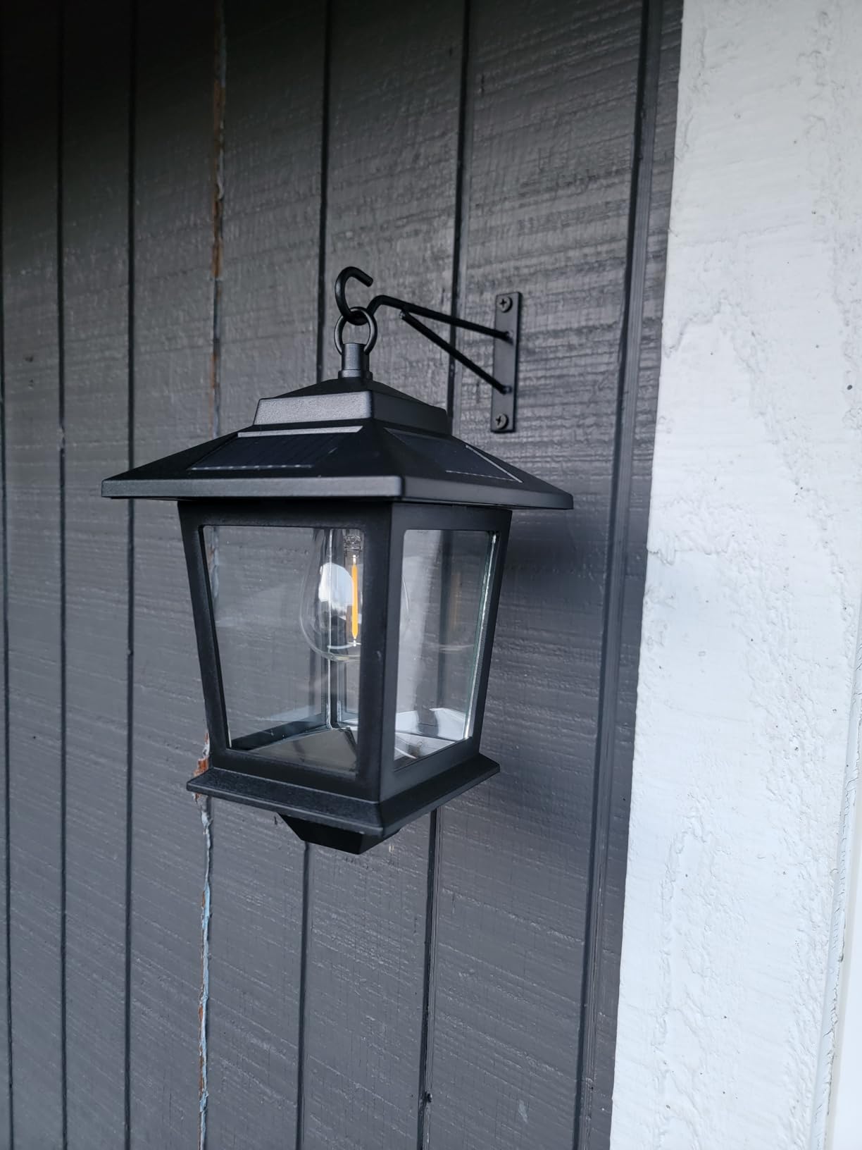 PASAMIC 2 Pack Solar Wall Lanterns,Outdoor Hanging Lights with 4 Solar Panels,Dusk to Dawn Led Outdoor Wall Sconce, Anti-Rust Waterproof Lanterns with Hooks,3000K Warm White customer photo 1