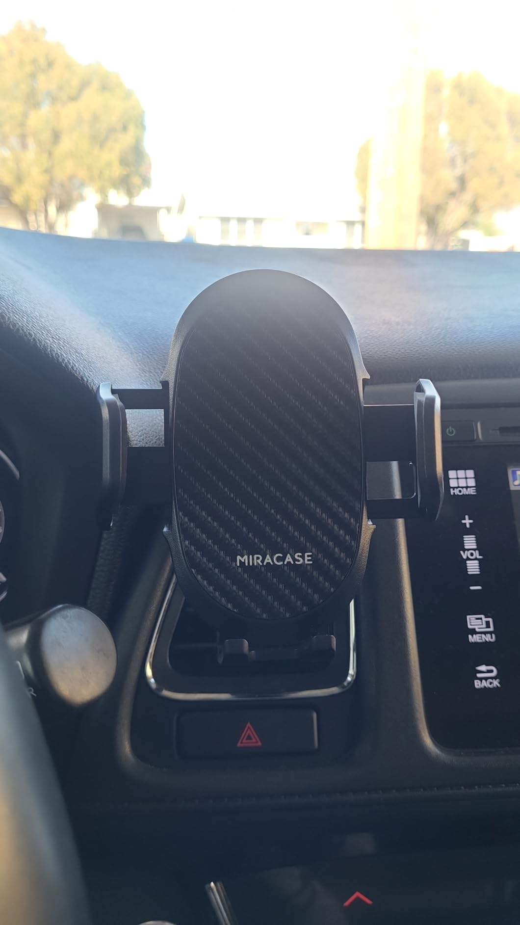 Miracase Phone Holders for Your Car with Metal Hook Clip, Air Vent Cell Phone Stand Car Mount, Universal Automobile Cradle for Garmin GPS Fit iPhone Android and All Smartphones, Dark Black Customer Review Miracase Phone Holders for Your Car with Metal Hook Clip, Air Vent Cell Phone Stand Car Mount, Universal Automobile Cradle for Garmin GPS Fit iPhone Android and All Smartphones, Dark Black - Customer Photo 3