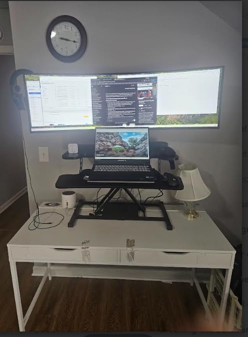 FLEXISPOT Standing Desk Converter 36in Sit to Stand up Riser Height Adjustable Monitor and Laptop Workstation with Spacious 2-Tier Desktop, Walnut Color Customer Review FLEXISPOT Standing Desk Converter 36in Sit to Stand up Riser Height Adjustable Monitor and Laptop Workstation with Spacious 2-Tier Desktop, Walnut Color - Customer Photo 1