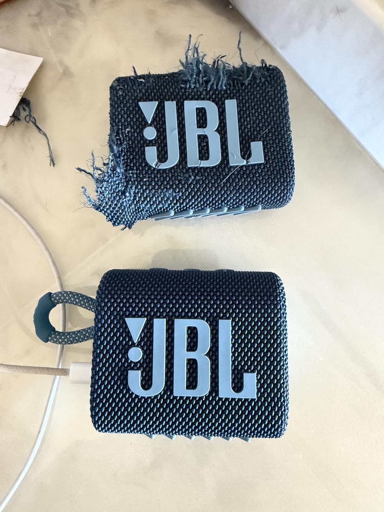 JBL Go 3 - Portable Mini Bluetooth Speaker, big audio and punchy bass, IP67 waterproof and dustproof, 5 hours of playtime (Black) customer photo 1