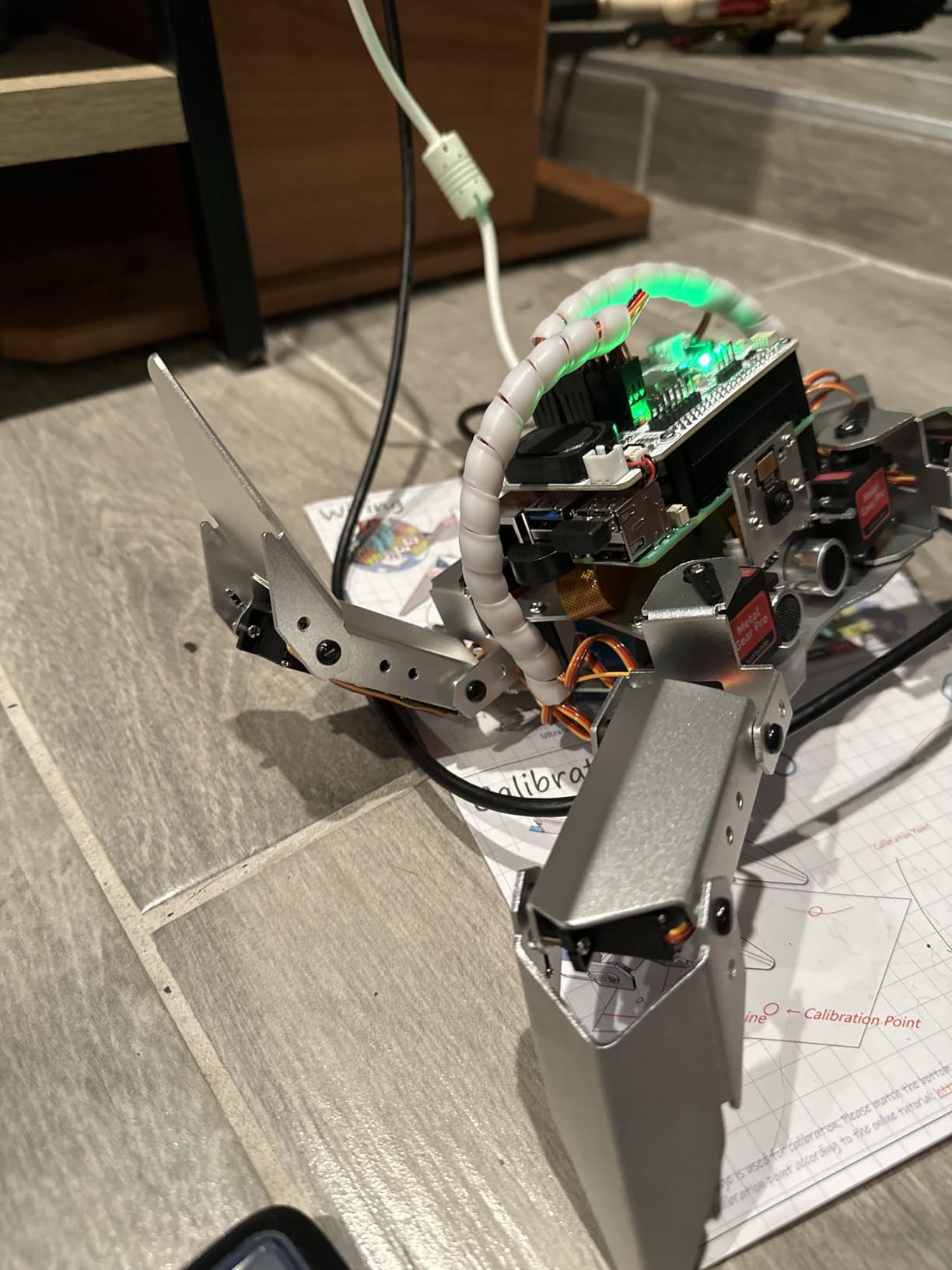 SunFounder PiCrawler AI Robot Kit for Raspberry Pi 5/4/3B+/3B/Zero 2W, ChatGPT-4o Enabled with Voice Command & Video Recognition, App Control, FPV, Camera, Python&Scratch (RPi NOT Included) customer photo 2