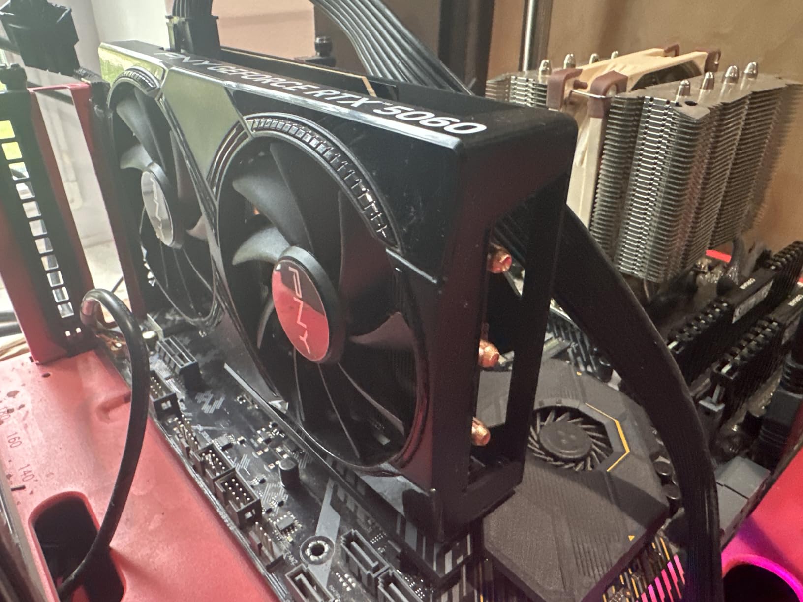 PNY NVIDIA GeForce RTX 5060 Epic-X ARGB OC Triple Fan, Graphics Card (8GB GDDR7, 128-bit, SFF-Ready, PCIe 5.0, HDMI/DP 2.1, 2-Slot, NVIDIA Blackwell Architecture, DLSS 4) customer photo 1