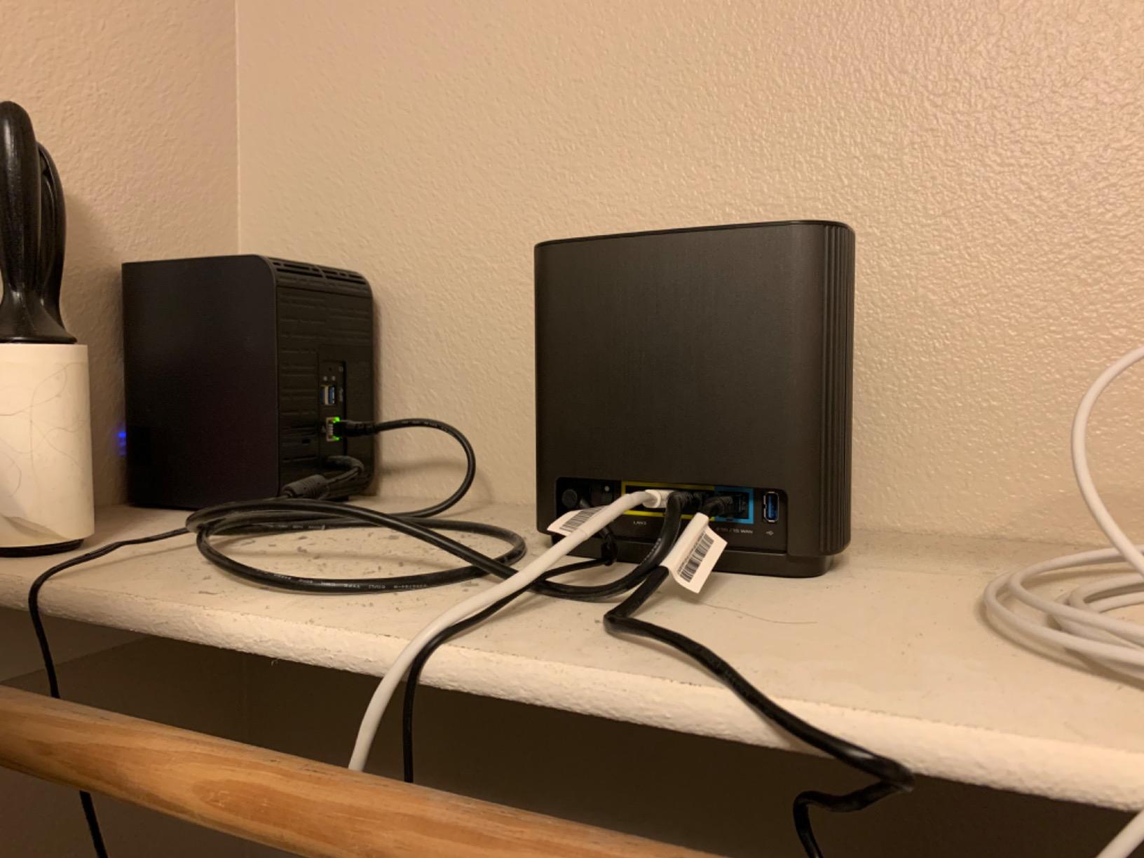 ASUS ZenWiFi AX Whole-Home Tri-Band Mesh WiFi 6 System (XT8) - 2 Pack, Coverage up to 5,500 sq.ft or 6+Rooms, 6.6Gbps, WiFi, 3 SSIDs, Life-time Network Security and Parental Controls, 2.5G Port customer photo 1