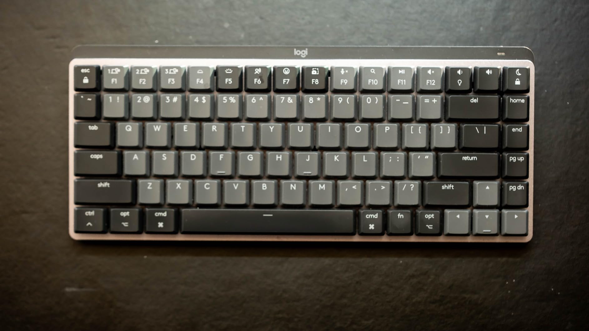 Logitech MX Mechanical Mini Mac Wireless Keyboard Low-Profile - Pale Grey | Low-profile full-size, 3 device Bluetooth pairing, Smart backlight auto-adjusts, USB-C rechargeable, Up to 15 day battery customer photo 1