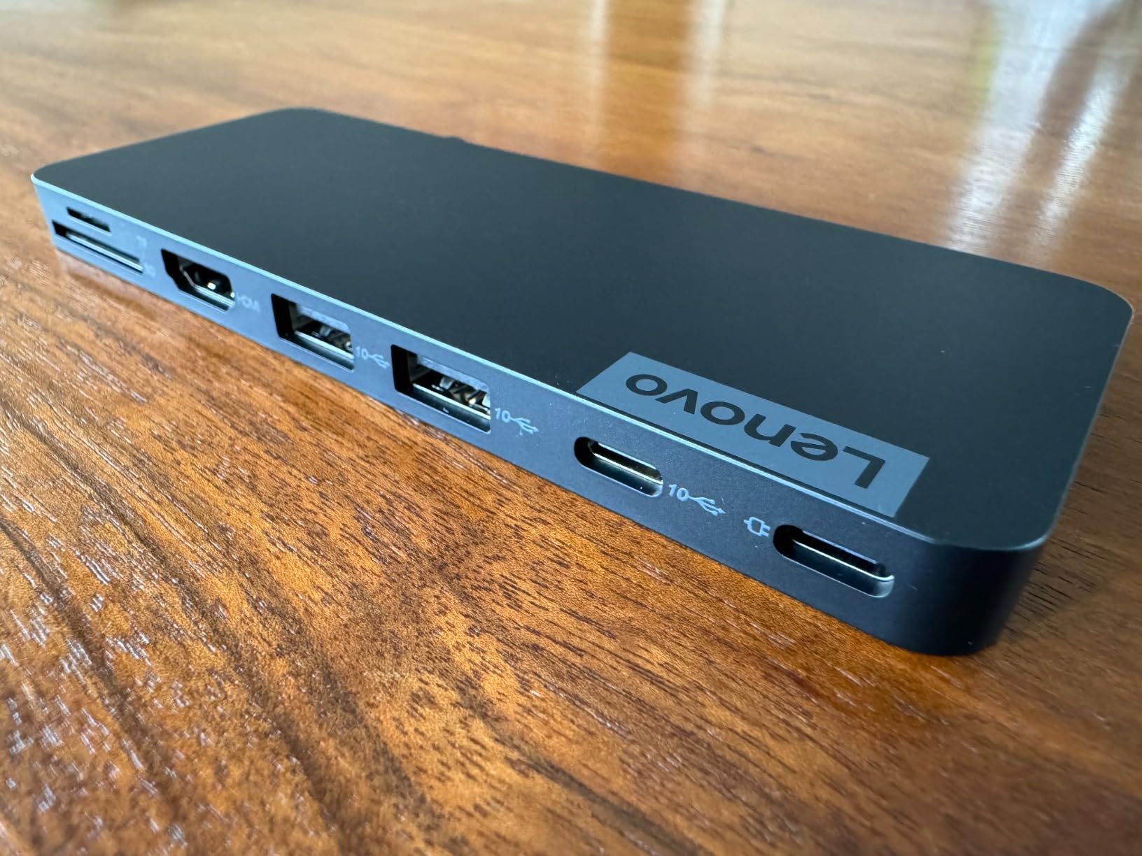 Lenovo USB-C Slim Travel Dock, 8 Ports, Up to 65W PD Pass Through, Integrated USB-C Cable, 4K Display Support, Black customer photo 1
