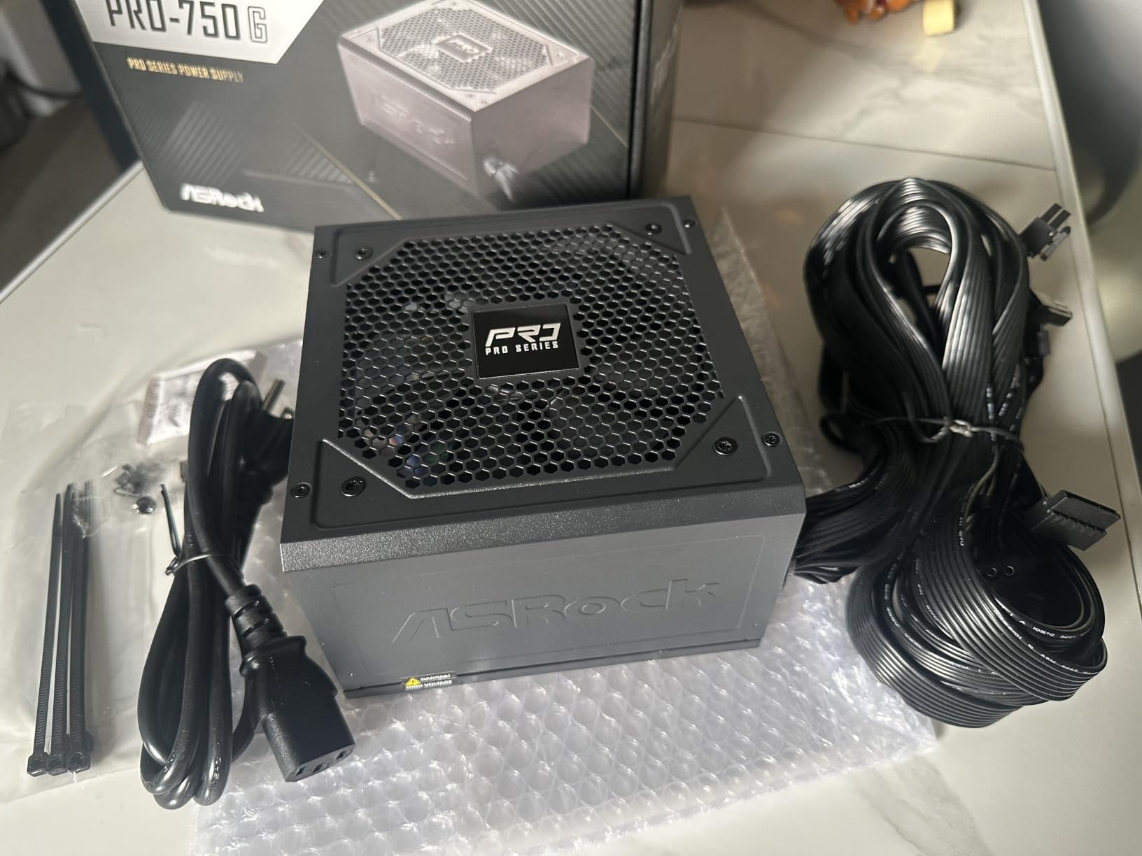 ASRock PRO 750G Power Supply - 750W 80 Plus Gold Certified, ATX 3.1 & PCIe 5.1 Ready, Native 12V-2x6 Connector, 120mm Low-Noise Fan, 3-Year Warranty customer photo 2