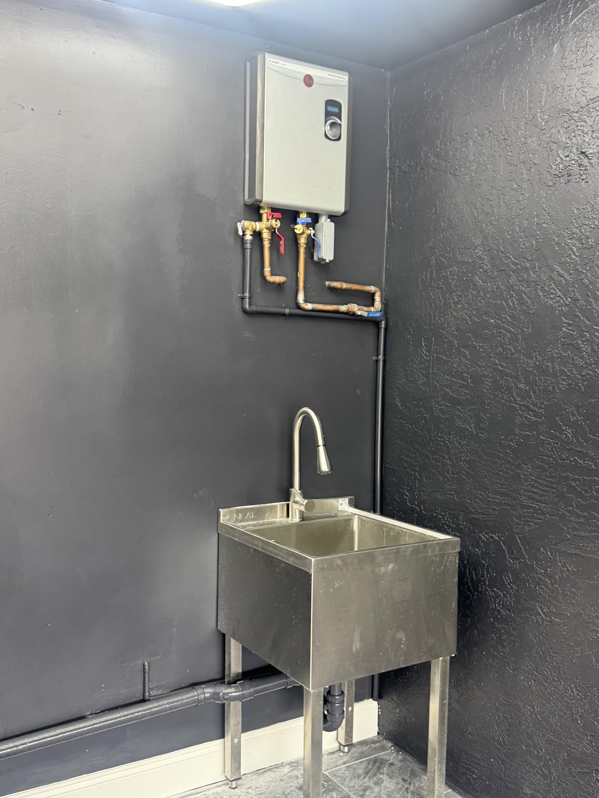 Rheem RTEX-08, 8kW Professional Classic 240V Tankless Electric Water Heater customer photo 1