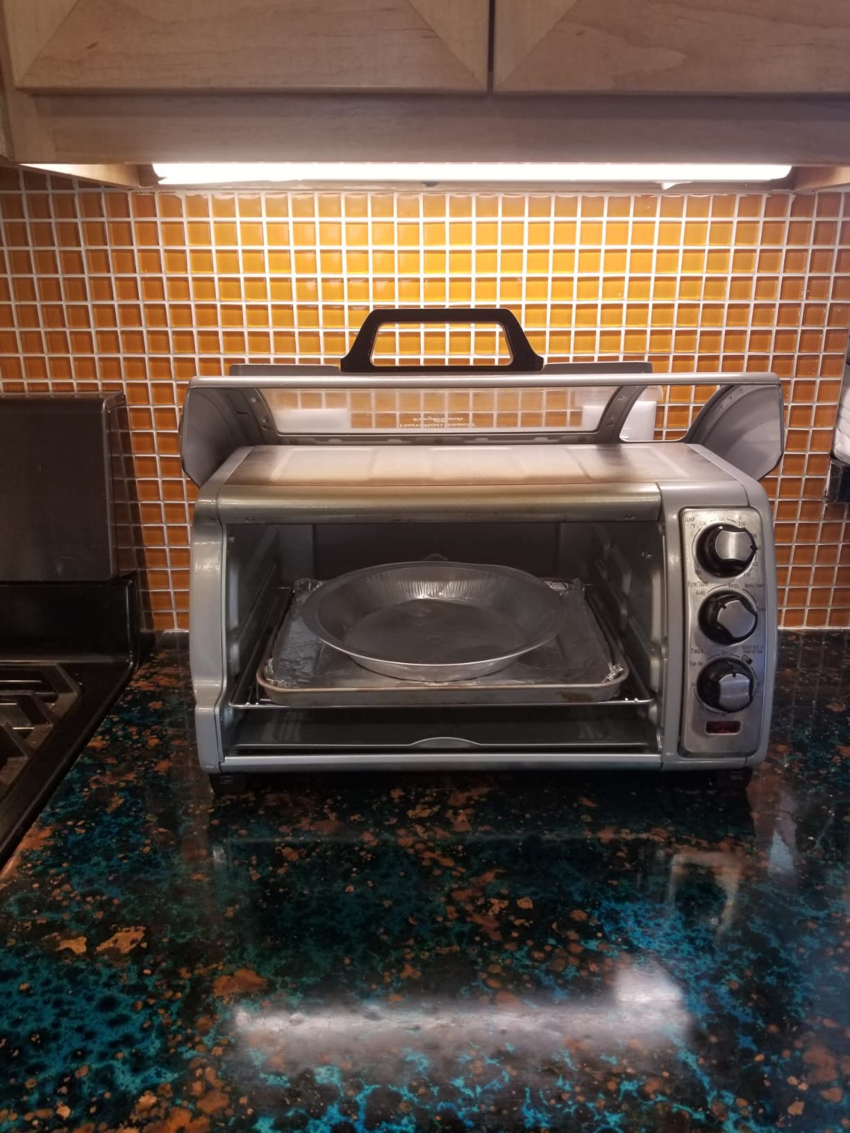 Hamilton Beach Easy Reach 6 Slice Countertop Toaster Oven | Roll-Top Door For Easy Access | Bake, Broil & Toast Functions | 150 to 450F Adjustable Temp | Auto Shutoff | Silver customer photo 1