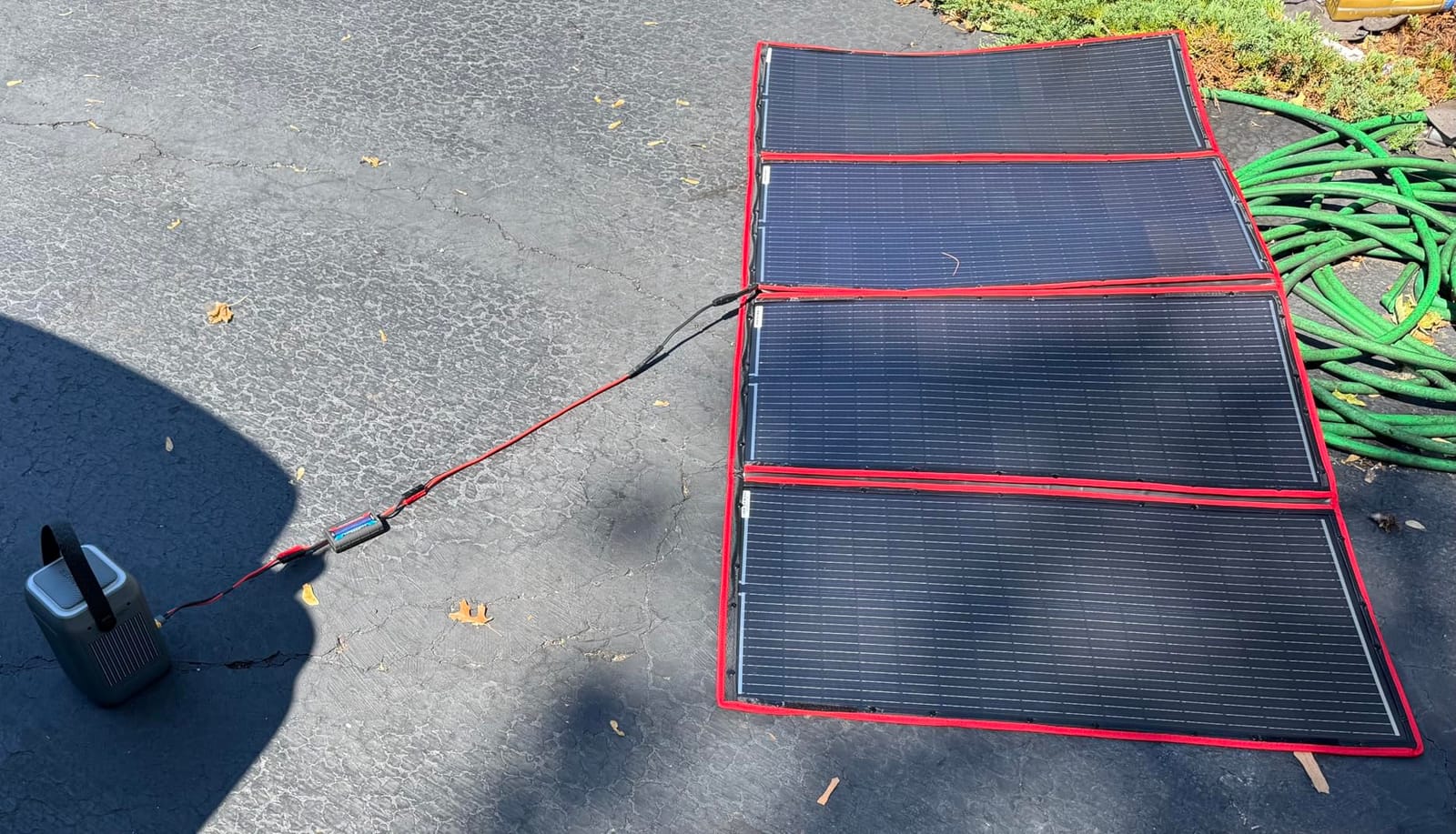 DOKIO 100W Portable Foldable Solar Panel Kit for 12V Battery Charging | Folds to 19 x 26 in and weighs 5.3 lb; includes controller and dual USB; for 12V batteries, power stations and camping customer photo 1