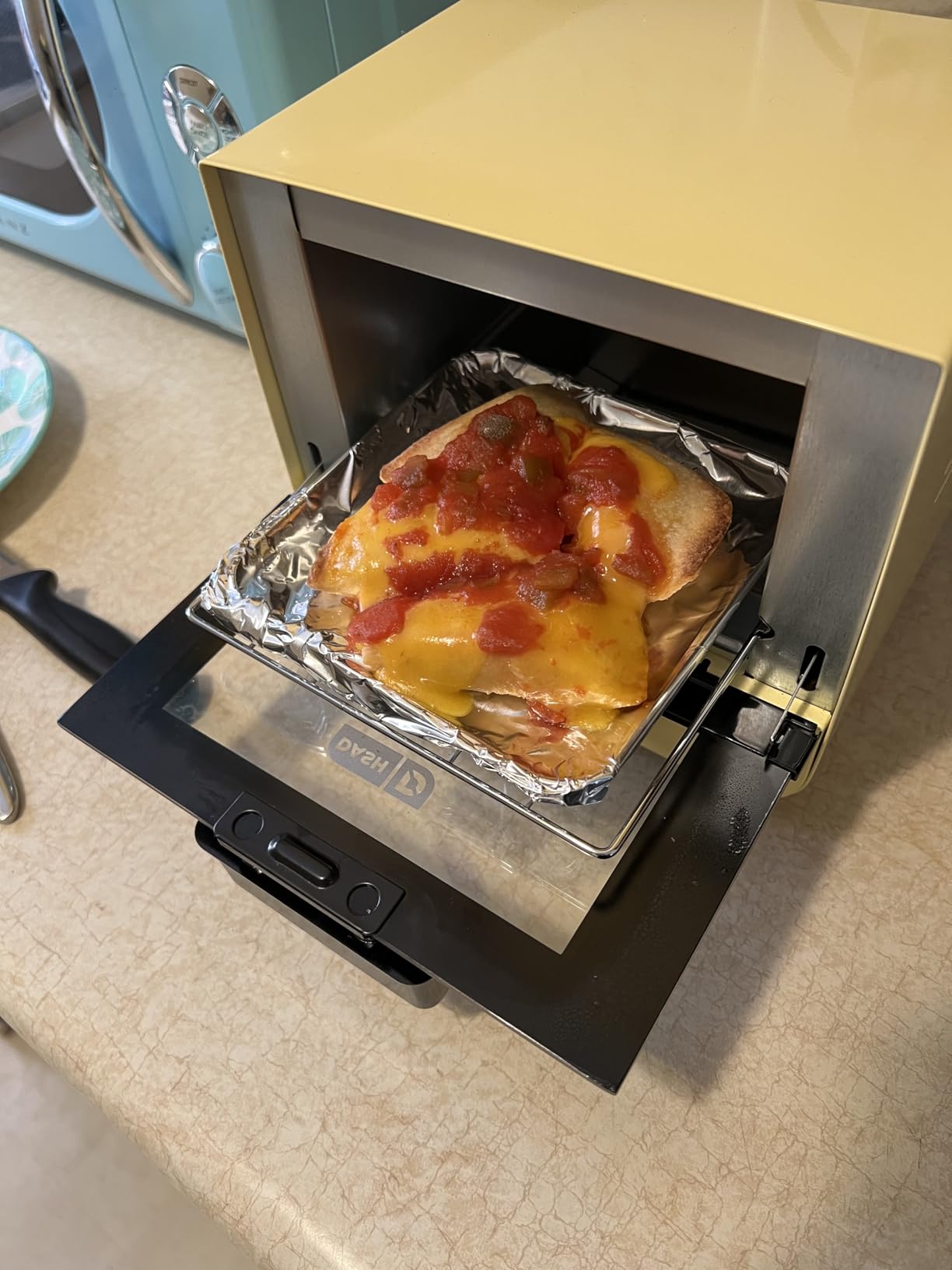 Dash Mini Toaster Oven | Small Toaster Oven for Dorms, Apartments, & Small Kitchens, Adjustable Timer Dial with Auto Shutoff, Removable Cooking Tray & Crumb Catch, Aqua customer photo 1