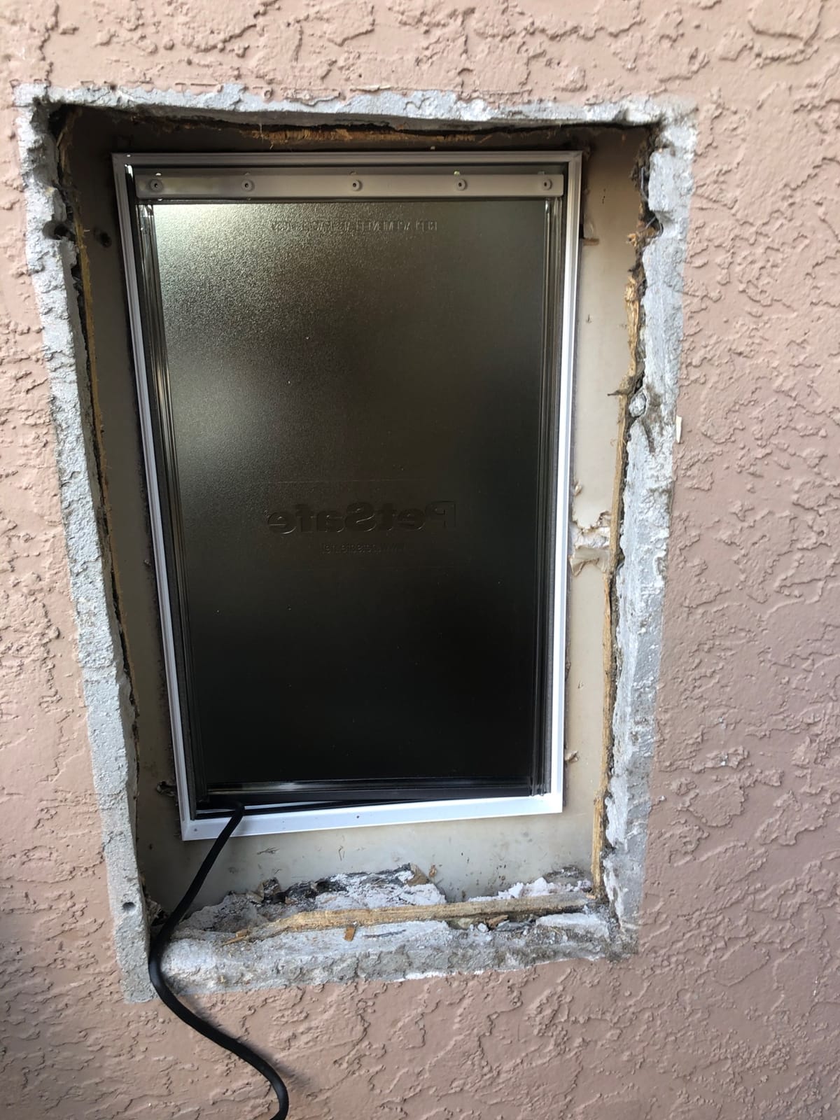 PetSafe Extreme Weather Aluminum Dog Door, 3-Flap Insulated, X-Large | Energy-Efficient, Blocks 3x More Thermal Loss, Reinforced Aluminum Frame, Magnetic Seal on Flap customer photo 1