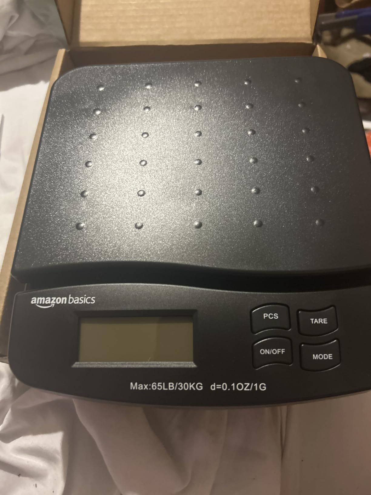 Amazon Basics Digital Postal Shipping Scale with Tare Function, AC Adapter, 65 lb Capacity, 0.1 oz Readability, LCD Display, Black customer photo 1
