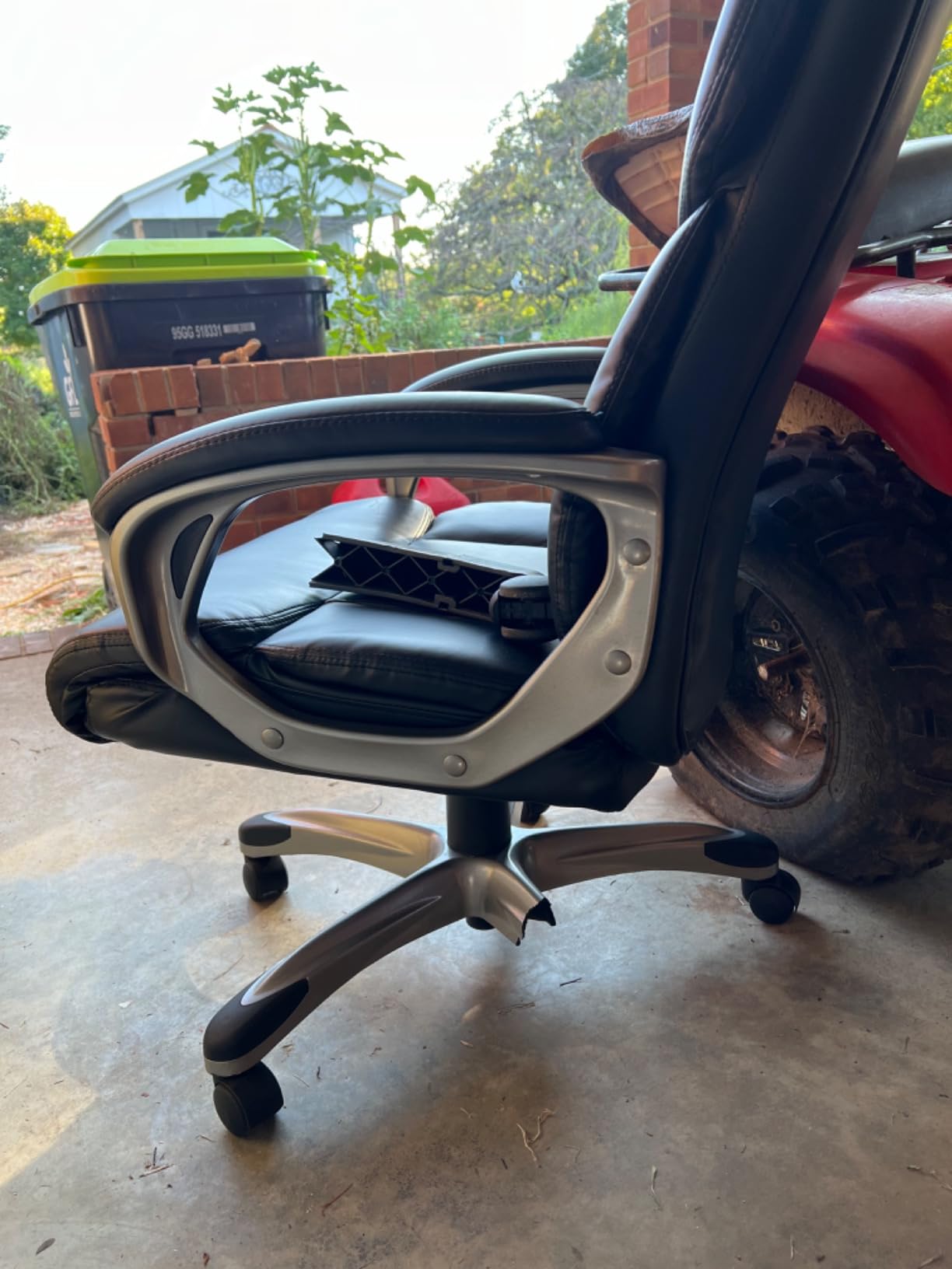 Amazon Basics Executive High Back Office Chair, Adjustable Height, Tilt, Swivel, Padded Seat, Bonded Leather, Wheels, Black/Silver customer photo 2