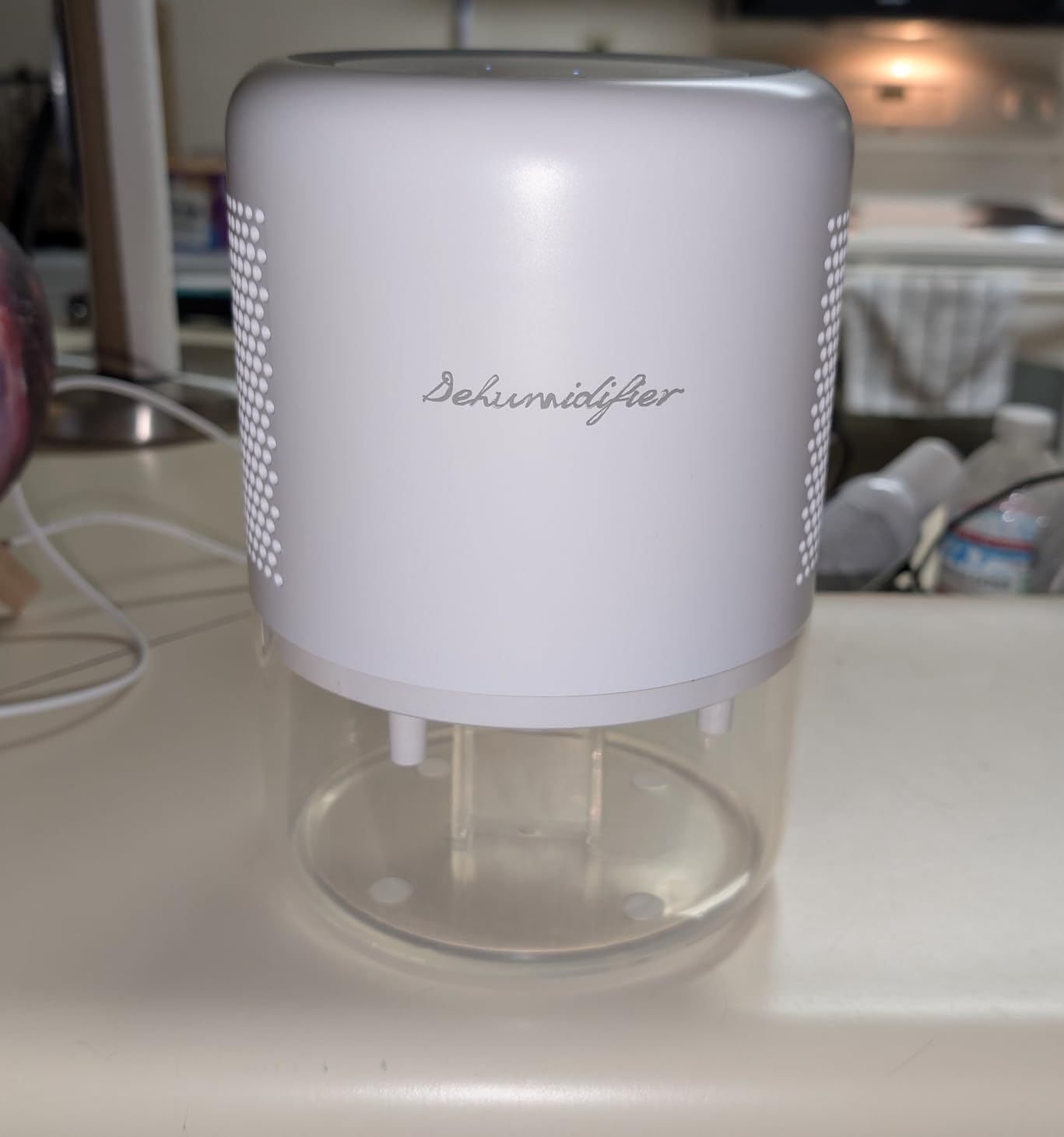 44oz(1.3L) Small Dehumidifier for Home Auto-Off Quiet Portable Dehumidifier with 3 Modes 10 Color Lights 4 Timer Settings for Bedroom Bathroom Closet (215 sq.ft) customer photo 1